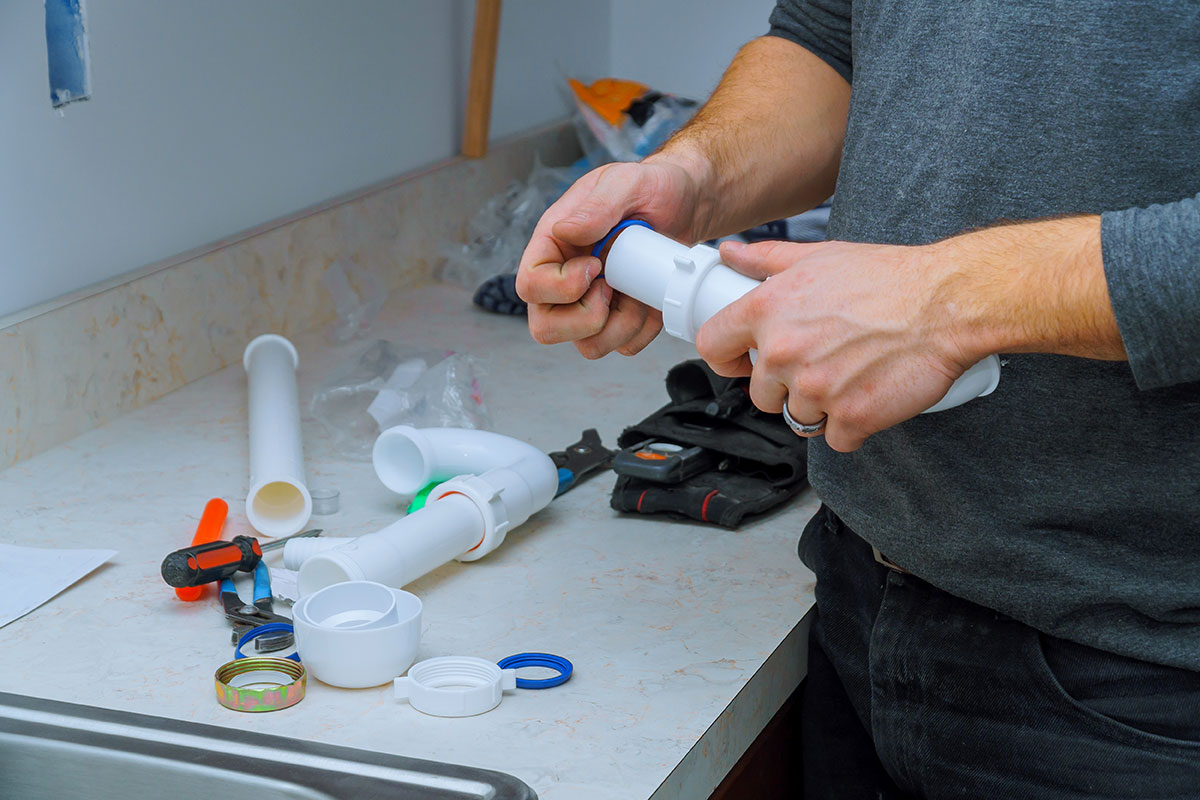 plumber fitting pipes
